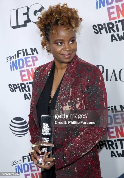 Director Dee Rees, winner of The Robert Altman Award for 'Mudbound', poses in the press room during the 2018 Film Independent Spirit Awards on March...