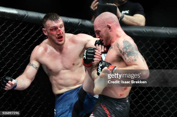 Jordan Johnson and Adam Milstead fight during their light heavyweight bout during UFC 222 at T-Mobile Arena on March 3, 2018 in Las Vegas, Nevada....