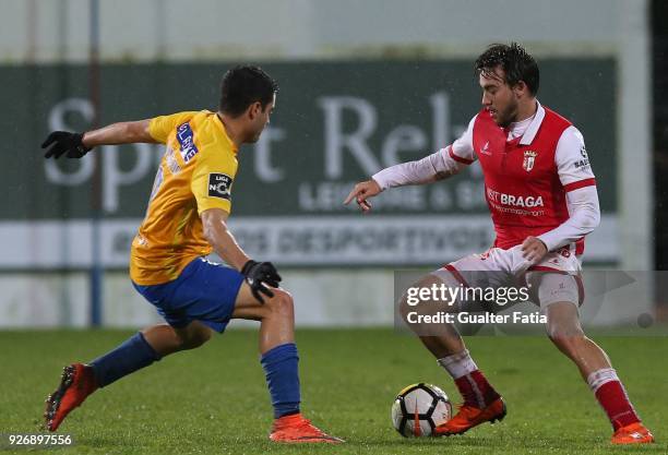 Braga midfielder Andre Horta from Portugal with GD Estoril Praia midfielder Eduardo Teixeira from Brazil in action during the Primeira Liga match...