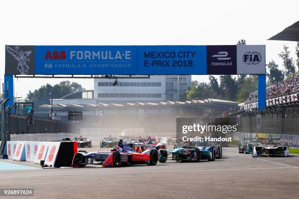 In this handout provided by FIA Formula E, Felix Rosenqvist , Mahindra Racing, Mahindra M4Electro, leads Oliver Turvey , NIO Formula E Team, NextEV...