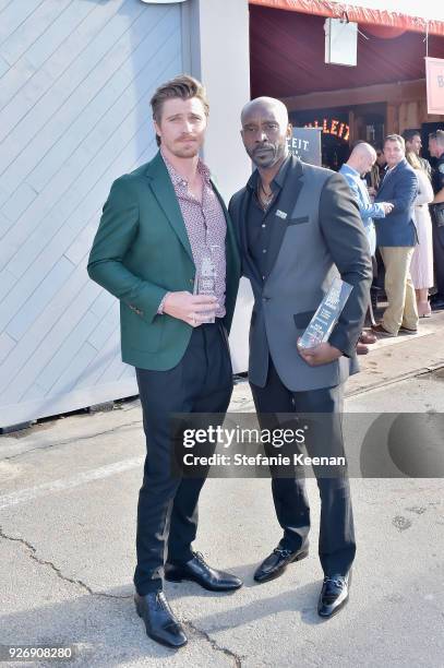 Actors Garrett Hedlund and Rob Morgan, winners of the Robert Altman Award for 'Mudbound,' celebrated with a Bulleit cocktail at the Bulleit Frontier...