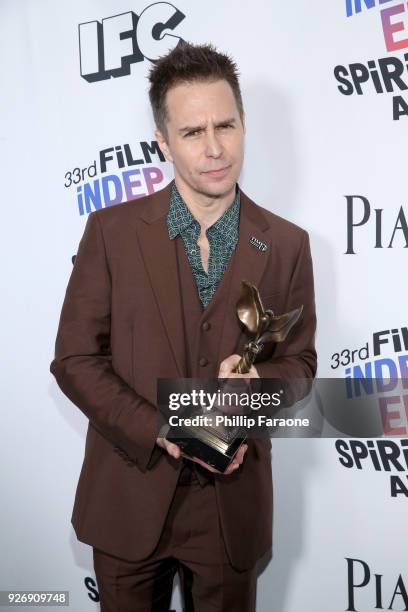 Actor Sam Rockwell, winner of Best Supporting Male for 'Three Billboards Outside Ebbing, Missouri', poses in the press room during the 2018 Film...