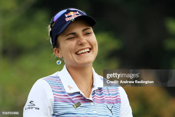 Lexi Thompson of the United States smiles on the 11th hole during the final round of the HSBC Women's World Championship at Sentosa Golf Club on...