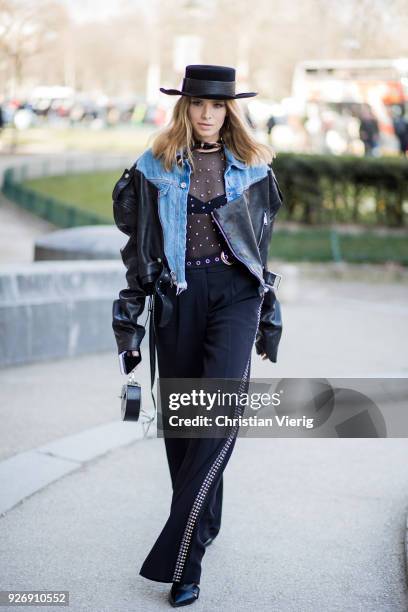 Lena Perminova wearing cowboy hat, sheer top, denim jacket is seen outside Elie Saab during Paris Fashion Week Womenswear Fall/Winter 2018/2019 on...