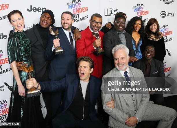 The cast of "Get Out" poses with the Best Feature Award in the press room during the 2018 Film Independent Spirit Awards, in Santa Monica,...