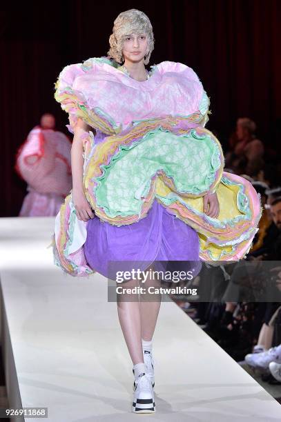 Model walks the runway at the Comme Des Garcons Autumn Winter 2018 fashion show during Paris Fashion Week on March 3, 2018 in Paris, France.