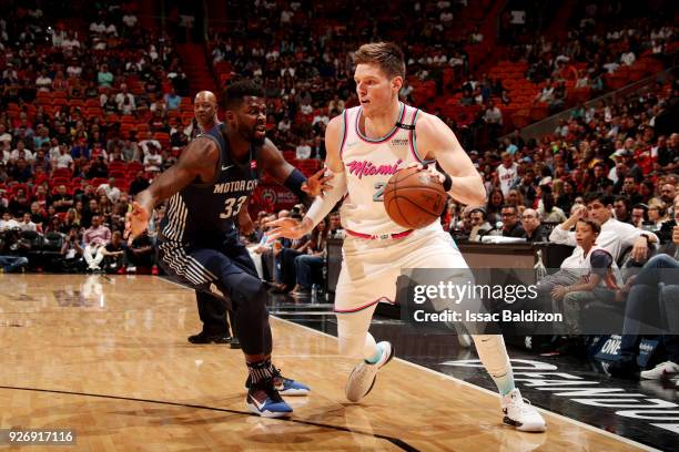 Luke Babbitt of the Miami Heat handles the ball during the game against the Detroit Pistons on March 3, 2018 at American Airlines Arena in Miami,...