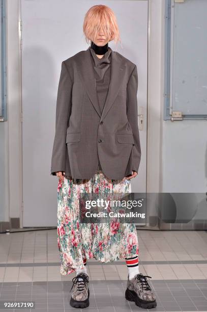 Model walks the runway at the Junya Watanabe Autumn Winter 2018 fashion show during Paris Fashion Week on March 3, 2018 in Paris, France.