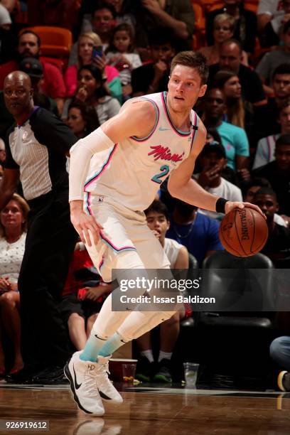 Luke Babbitt of the Miami Heat handles the ball during the game against the Detroit Pistons on March 3, 2018 at American Airlines Arena in Miami,...