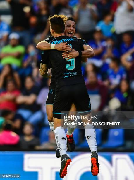 Queretaro's Camilo da Silva celebrates his goal against Cruz Azul with teammate Everaldo Stum, during their Mexican Clausura 2018 tournament football...
