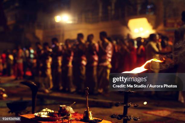 ganga aarti ceremony held on edge of ganges river, varanasi, uttar pradesh, india - arctis stock pictures, royalty-free photos & images