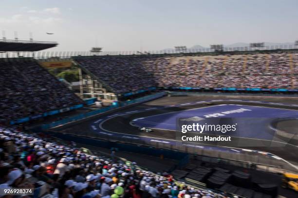 In this handout provided by Jaguar Racing, Nelson Piquet Jr. , Panasonic Jaguar Racing, Jaguar I-Type II leadsMitch Evans , Panasonic Jaguar Racing,...