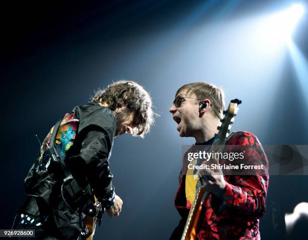 Wayne Sermon and Ben McKee of Imagine Dragons perform a sold out show at Manchester Arena on March 3, 2018 in Manchester, England.