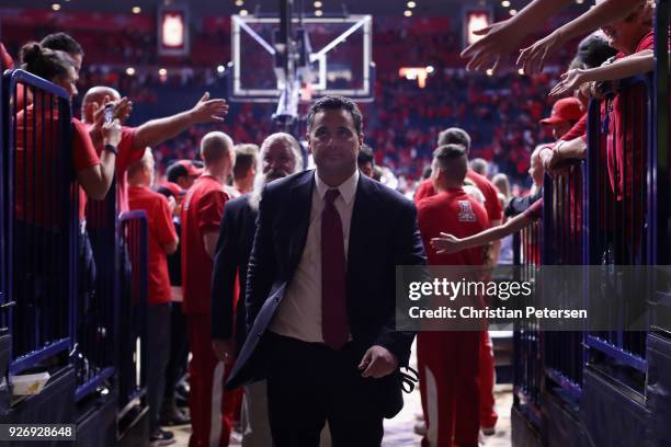 Head coach Sean Miller of the Arizona Wildcats walks off the court following the college basketball game against the California Golden Bears at...