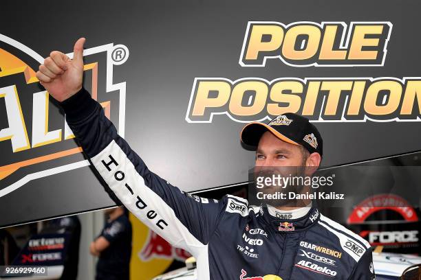 Shane Van Gisbergen driver of the Red Bull Holden Racing Team Holden Commodore ZB celebrates after taking pole position during the top ten shootout...