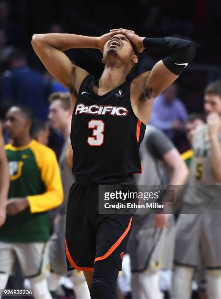 Miles Reynolds of the Pacific Tigers walks off the court after the team's 71-70 overtime loss to the San Francisco Dons in a quarterfinal game of the...