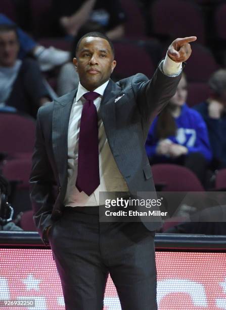 Head coach Damon Stoudamire of the Pacific Tigers gestures during a quarterfinal game of the West Coast Conference basketball tournament against the...