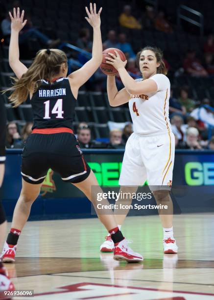 Iowa State Rae Johnson looking to make play while Texas Tech Lauren Harrison plays defense during the Texas Tech Lady Red Raiders Big 12 Women's...