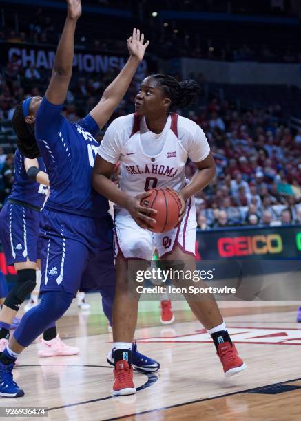 Oklahoma Vionise Pierre_Louis making her move in the paint during the Oklahoma Sooners Big 12 Women's Championship game versus the TCU Horned Frogs...