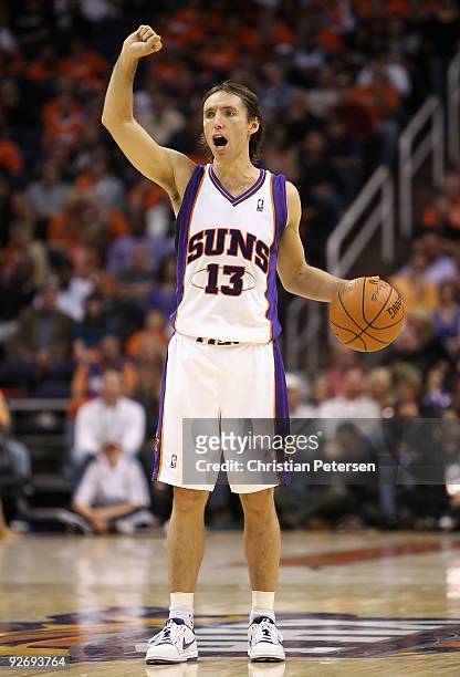 Steve Nash of the Phoenix Suns handles the ball during the NBA game against the Golden State Warriors at US Airways Center on October 30, 2009 in...