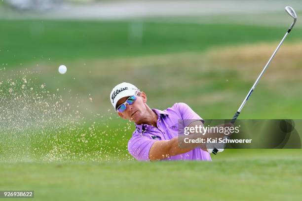 Berry Henson of the United States plays a bunker shot during day four of the ISPS Handa New Zealand Golf Open at Millbrook Golf Resort on March 4,...