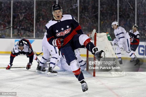 John Carlson of the Washington Capitals celebrates his goal against the Toronto Maple Leafs during the second period in the Coors Light NHL Stadium...