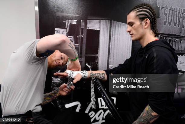 Sean O'Malley has his hands wrapped backstage prior to his bout against Andre Soukhamthath during the UFC 222 event inside T-Mobile Arena on March 3,...