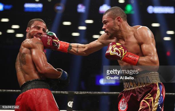 Jose Uzcategui punches Andre Dirrell during their IBF interim super middleweight title fight at Barclays Center on March 3, 2018 in the Brooklyn...