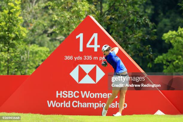 Austin Ernst of the United States plays her shot from the 14th tee during the final round of the HSBC Women's World Championship at Sentosa Golf Club...