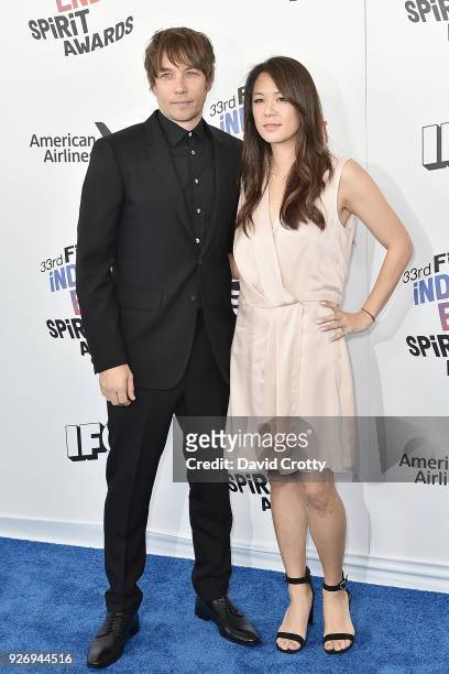 Sean Baker and Samantha Kwan attend the 2018 Film Independent Spirit Awards - Arrivals on March 3, 2018 in Santa Monica, California.