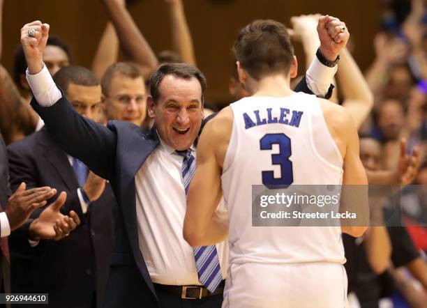 Head coach Mike Krzyzewski of the Duke Blue Devils celebrates with Grayson Allen of the Duke Blue Devils as they defeat the North Carolina Tar Heels...