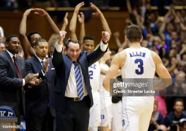 Head coach Mike Krzyzewski of the Duke Blue Devils celebrates with Grayson Allen of the Duke Blue Devils as they defeat the North Carolina Tar Heels...