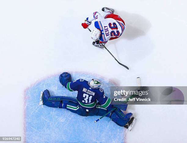 Anders Nilsson of the Vancouver Canucks makes a save off the shot of Jimmy Vesey of the New York Rangers during their NHL game at Rogers Arena...