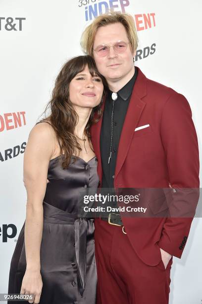 Georgie Greville and Geremy Jasper attend the 2018 Film Independent Spirit Awards - Arrivals on March 3, 2018 in Santa Monica, California.