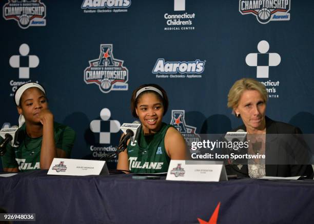 Tulane Green Wave Head Coach Lisa Stockton , Tulane Green Wave Guard Kayla Manuirirangi , and Tulane Green Wave Center Harlyn Wyatt answer questions...