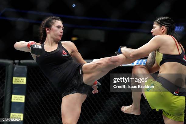 Cat Zingano kicks Ketlen Vieira during their women's bantamweight bout during UFC 222 at T-Mobile Arena on March 3, 2018 in Las Vegas, Nevada. Vieira...