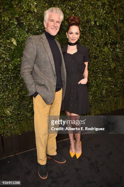 Matthew Modine and Caridad Modine attend Charles Finch and Chanel Pre-Oscar Awards Dinner at Madeo in Beverly Hills on March 3, 2018 in Beverly...