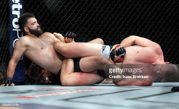 Stefan Struve and Andrei Arlovski grapple during their heavyweight bout during UFC 222 at T-Mobile Arena on March 3, 2018 in Las Vegas, Nevada.