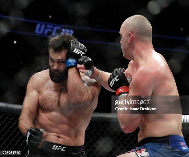 Stefan Struve and Andrei Arlovski fight during their heavyweight bout during UFC 222 at T-Mobile Arena on March 3, 2018 in Las Vegas, Nevada.