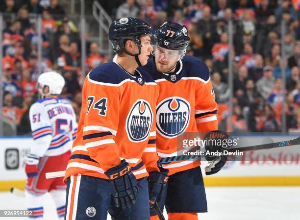 Ethan Bear and Oscar Klefbom of the Edmonton Oilers discuss the play during the game against the New York Rangers on March 3, 2018 at Rogers Place in...
