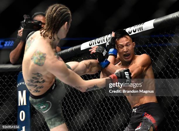 Sean O'Malley kicks Andre Soukhamthath in their bantamweight bout during the UFC 222 event inside T-Mobile Arena on March 3, 2018 in Las Vegas,...