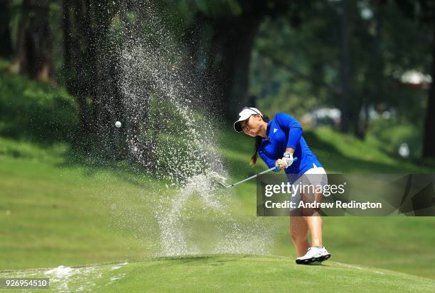 Danielle Kang of the United States plays her third shot on the 12th hole during the final round of the HSBC Women's World Championship at Sentosa...