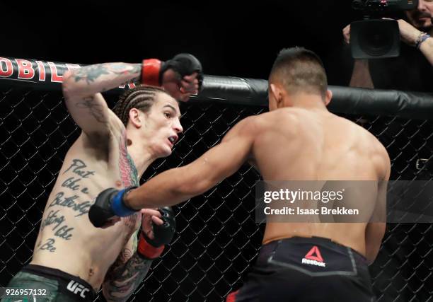 Sean O'Malley and Andre Soukhamthath fight during their bantamweight bout during UFC 222 at T-Mobile Arena on March 3, 2018 in Las Vegas, Nevada.