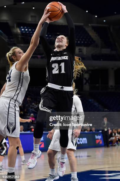 Providence Lady Friars guard Maddie Jolin has her shot challenged by Butler Bulldogs forward Tori Schickel on March 3, 2018 at the Wintrust Arena...