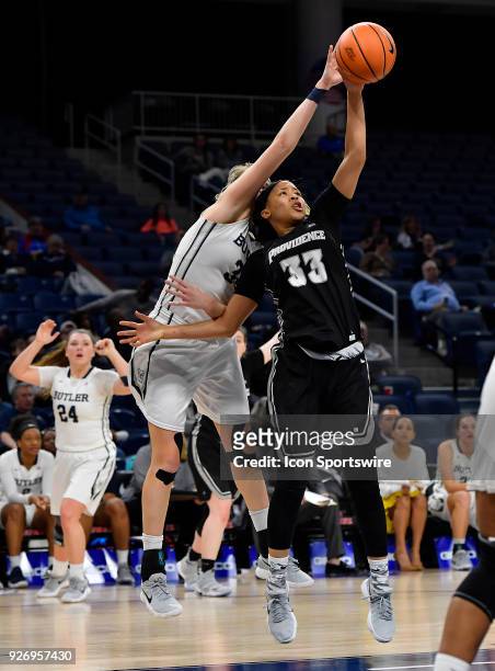 Providence Lady Friars forward Andrea Cooper grabs the rebound during the game against the Butler Bulldogs on March 3, 2018 at the Wintrust Arena...