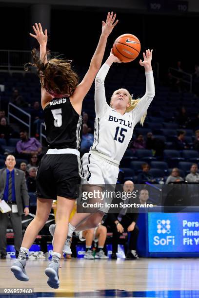 Butler Bulldogs guard Whitney Jennings shoots over Providence Lady Friars guard Kyra Spiwak during the game on March 3, 2018 at the Wintrust Arena...