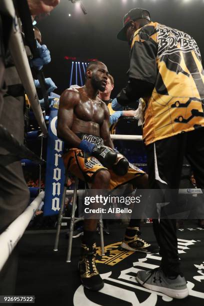 Deontay Wilder is tended to in his corner against Luis Ortiz during their WBC Heavyweight Championship fight at Barclays Center on March 3, 2018 in...