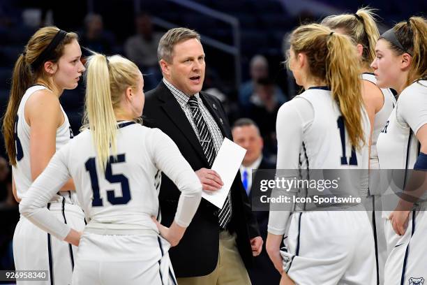 Butler Bulldogs head coach Kurt Godlevske discusses with team during the game against the Providence Lady Friars on March 3, 2018 at the Wintrust...