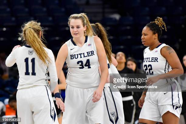 Butler Bulldogs forward Tori Schickel looks to high five Butler Bulldogs guard Michelle Weaver during the game against the Providence Lady Friars on...