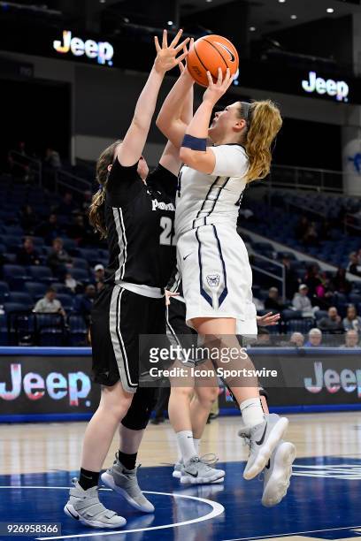 Butler Bulldogs guard Kristen Spolyar shoots over Providence Lady Friars guard Olivia Orlando during the game on March 3, 2018 at the Wintrust Arena...